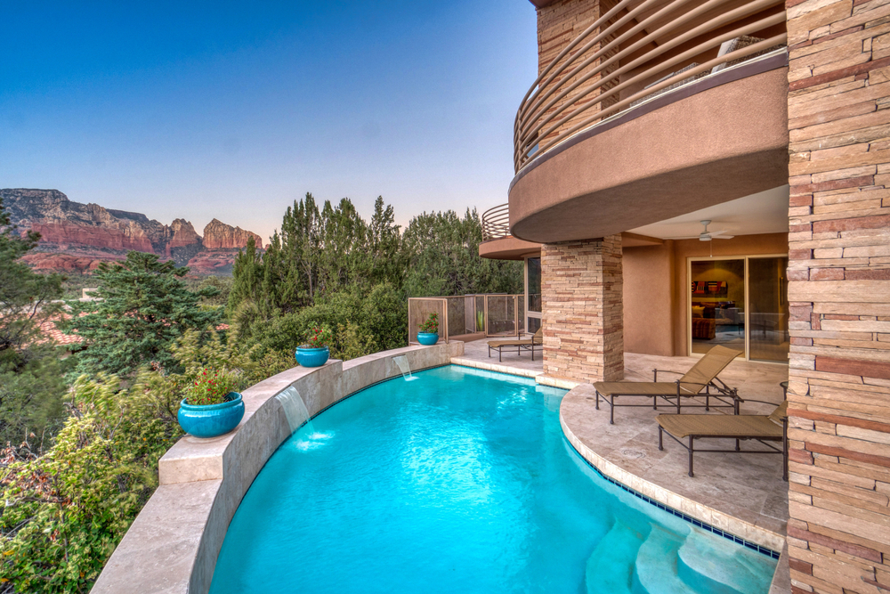 Luxury hotel swimming pool overlooking a rocky vista in Utah