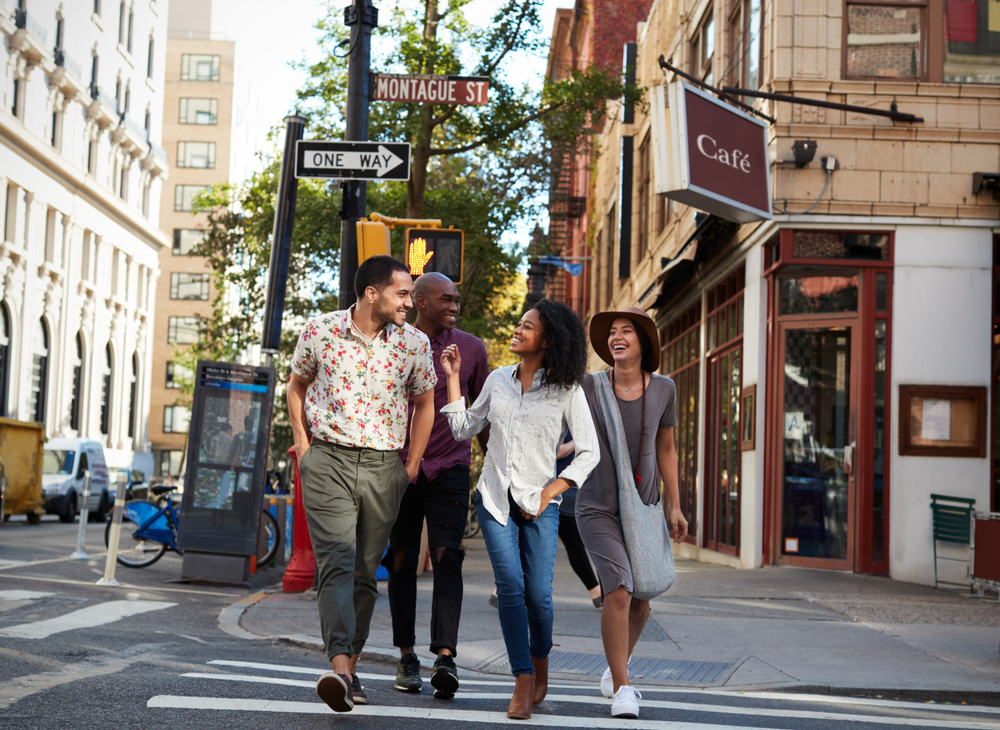 Travelers walking through a city